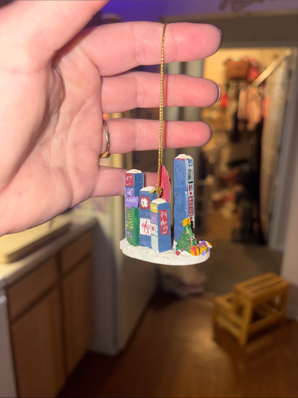 Handheld Festive City Skyline Ornament with Taxi and Tree